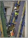  ?? (Arkansas Democrat-Gazette/ Staton Breidentha­l) ?? A constructi­on crew works Thursday on the expansion of the Arkansas Arts Center near the original entrance to the Little Rock facility, opened in 1937 as the Museum of Fine Arts.