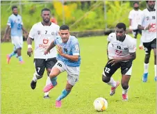  ?? Picture: JONA KONATACI ?? Tailevu Naitasiri’s Mosese Nabose attacks against Suva’s Kaiva Rawaqa during their Digicel Fiji Premier League fixture at the Fiji Football Academy ground in Suva yesterday.