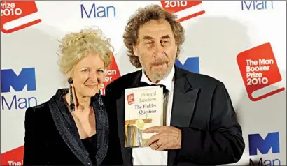  ?? PHOTO: PA ?? Howard Jacobson and his wife Jenny celebrate his winning the 2010 Man Booker Prize. J is longlisted for 2014