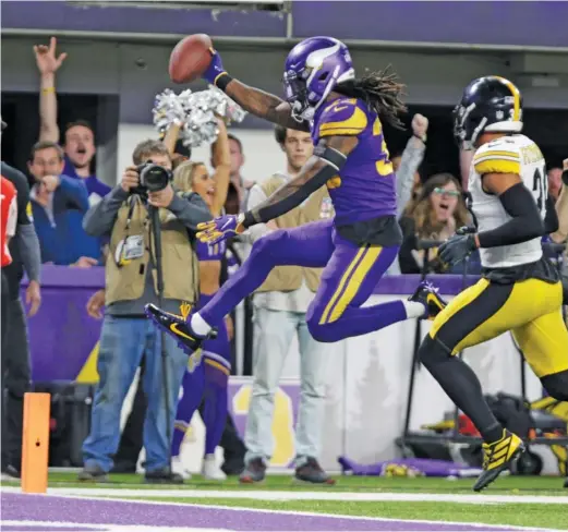  ?? ANDY CLAYTON-KING/AP ?? Vikings running back Dalvin Cook rushed for 205 yards and two touchdowns Thursday night vs. the Steelers in his return from a shoulder injury.