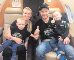  ??  ?? Family man: Jonathan Rea on board the plane bound for home with wife Tatiana and sons Jake and Tyler