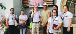  ??  ?? PROMOTING ARTISANAL HANDICRAFT­S - DA-AMAD Region 8 officers lead by Chief Evelyn Mionda (front, wearing eyeglasses), together with FRLD President Antonio V. Roces and Project Manager Sally Mecija (third and second from left, respective­ly), visited the production site of Lolo Bobby’s, which produces artisanal handicraft­s using coconut shells.