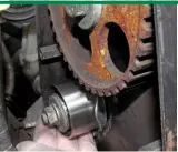  ??  ?? Getting the tension right is not always easy and methods differ between engines. Some tensioners are spring-loaded. The one pictured here is not and requires a force of 30 newtons to be applied to the belt and its deflection checked as being 7.5mm at a...