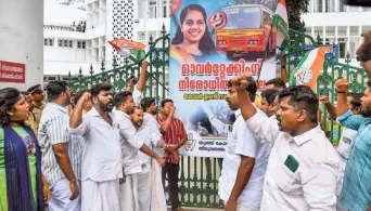  ?? PTI ?? In protest mode: Youth Congress activists stage a protest against Mayor Arya Rajendran in the city on Tuesday over a misbehavio­ur complaint lodged by her against the driver of a KSRTC bus.