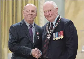  ?? CANADIAN PRESS FILE PHOTO ?? Hockey play-by-play great Bob Cole is seen with then governor general David Johnston as Cole is invested as a member of the Order of Canada in 2016. Sportsnet says Cole will call 10 games in his 50th and final season on Hockey Night in Canada.