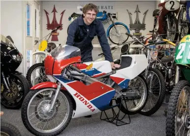  ??  ?? ABOVE: George with one of the two Honda RS125 production racers in the collection