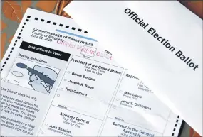  ?? GENE J. PUSKAR — THE ASSOCIATED PRESS FILE ?? An official Democratic general primary mail-in ballot and secrecy envelope, for the Pennsylvan­ia primary in Pittsburgh.