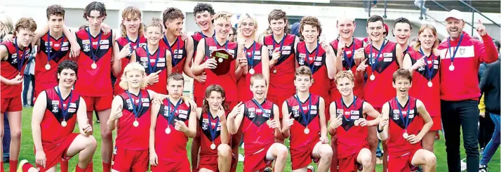  ?? ?? The Western Gippsland under 14s premiershi­p side.
Back: Ollie Ockwell-Payne, Jesse Etchell, Cooper Amey, Blake Bibby, Lincon Tannerhill, Joe Zaccari, Riley Butters, Cody Templeton (captain), Angus Watts (vice-captain), Charlie Kilmartin, James Patterson, Ryland Butler, Cody Welch, Ethan Seskis, Kai Kelsey Heath Logan (coach)
Front: Harry Herbert, Declan Shortis, Tyler Harkin, Kody Budnik, Max Steenholdt, Liam Pirotta (vice-captain), Cooper Beckley and Ash Mounsey. Absent: Nic Fogarty (assistant coach).