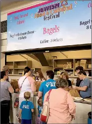  ?? Democrat-Gazette file photo ?? Little Rock’s annual Jewish Food and Cultural Festival, coming April 10, is the place to bag a bagel.