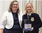  ?? PHOTO PROVIDED BY GINA NEFF ?? Utica agricultur­e education teacher and FFA advisor Gina Neff, left, and Utica graduate Amanda Annett, right, celebrate at the National FFA Convention in Indianapol­is after Annett won first place in beef placement proficienc­y.