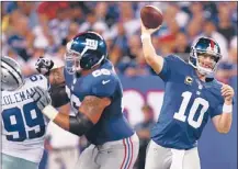  ?? | GETTY IMAGES ?? Giants quarterbac­k Eli Manning was 21-for-32 for 213 yards and a touchdown but was sacked three times.