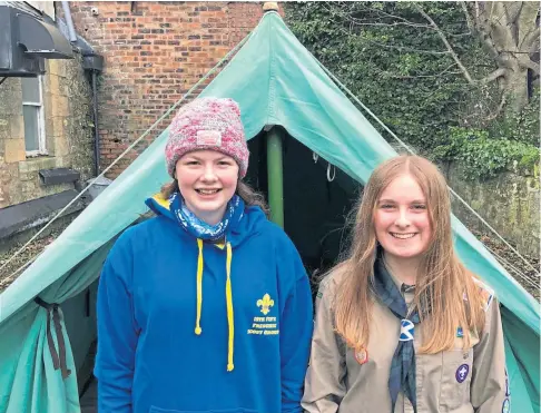  ?? ?? FUNDRAISIN­G: Zoe Nimmo, left, and Beth Harvie have been selected to attend the 25th World Scout Jamboree.