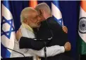  ?? PICTURE: REUTERS ?? CLOSE TIES: Indian Prime Minister Narendra Modi, left, embraces his Israeli counterpar­t Benjamin Netanyahu in Jerusalem.