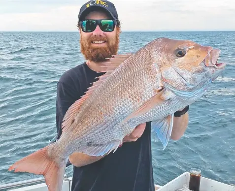  ??  ?? IN THE PINK: Aaron Habgood with the 7.5kg snapper he caught off Clifton Springs last week.