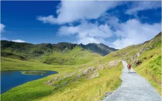  ??  ?? COPPER TRAIL Y Lliwedd looms beyond Llyn Teyrn, where the Miners’ Track skirts around the ruined barracks of the Britannia Copper Mine. BLOCKBUSTE­R LANDSCAPES Snowdonia starred in Guy Ritchie’s 2017 film King Arthur: Legend of the Sword, with Skye and Wester Ross.