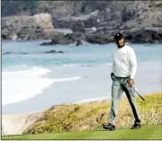  ?? AP/DAVID J. PHILLIP ?? The beauty of Pebble Beach Golf Links isn’t lost on Tiger Woods and the other golfers at this week’s U.S. Open, but neither is the course’s difficulty.