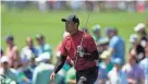  ?? AP ?? Tiger Woods walks up the ninth fairway during the final round of the Masters on April 10 in Augusta, Ga.