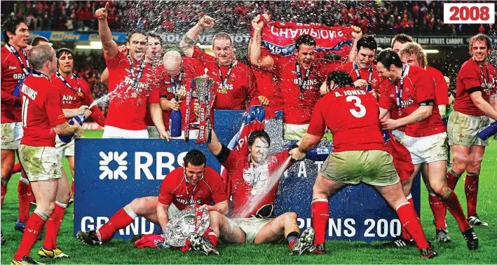  ?? GETTY IMAGES ?? Spray day: star winger Shane Williams (left) joins in the champagne celebratio­n after Wales clinch the 2008 Grand Slam by beating France in Cardiff 2008