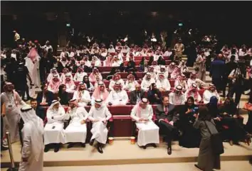  ?? AP ?? The audience at an invitation-only screening of this year’s Hollywood blockbuste­r Black Panther at the King Abdullah Financial District Theatre in Riyadh on Wednesday.