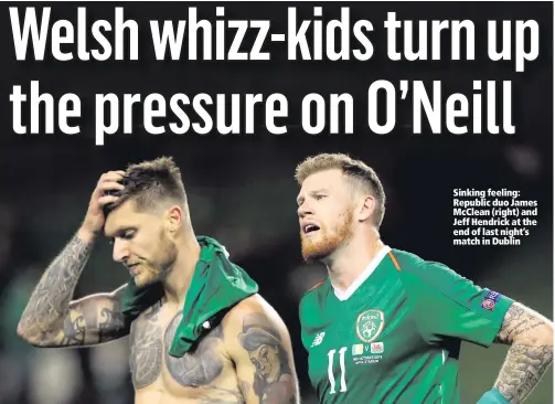  ??  ?? Sinking feeling: Republic duo James McClean (right) and Jeff Hendrick at the end of last night’s match in Dublin