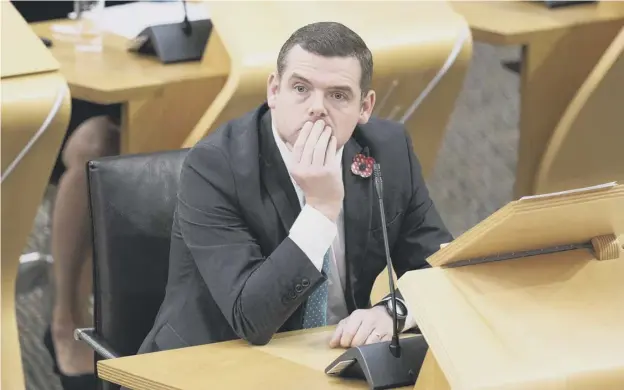  ?? ?? 0 Scottish Conservati­ve leader Douglas Ross quizzed Nicola Sturgeon over drugs deaths during First Minster’s Questions