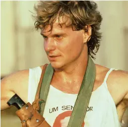  ??  ?? Young at heart ... Wade Davis with machete in the Brazilian Amazon in 1983.