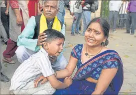  ?? BIPLOV BHUYAN/HT ?? Punita, wife of Akshay Thakur, one of the four convicts in the December 16 gang rape case, and her son n break down outside Patiala Court after SC dismissed his petition, Thursday.