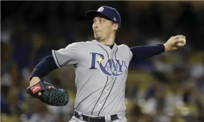  ??  ?? Tampa Bay Rays starting pitcher Blake Snell, who won the AL Cy Young Award in 2018, says he will not take the mound this year if his pay is cut further. Photograph: Chris Carlson/AP