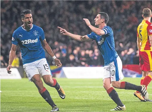  ??  ?? LATE SHOW: Rangers’ Graham Dorrans, right, celebrates scoring his side’s second goal