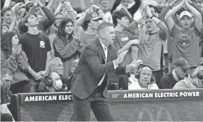  ?? ADAM CAIRNS/COLUMBUS DISPATCH ?? In his annual evaluation, Ohio State men’s basketball coach Chris Holtmann was deemed to have exceeded expectatio­ns in four of seven categories. He met expectatio­ns in the three remaining categories.