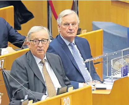  ?? Picture: Getty. ?? European Commission president Jean-Claude Juncker, left, and EU chief Brexit negotiator Michel Barnier attend to make a speech at the European Parliament in Brussels.