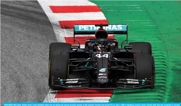  ??  ?? SPIELBERG: Mercedes’ British driver Lewis Hamilton steers his car during the second practice session at the Austrian Formula One Grand Prix on July 3, 2020 in Spielberg, Austria. Seven months after they last competed in earnest, the Formula One circus will push a post-lockdown ‘re-set’ button to open the 2020 season in Austria today. —AFP