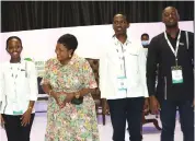 ?? ?? Environmen­t and Tourism patron First Lady Dr Auxillia Mnangagwa interacts with a member of the Rwandan delegation after handing them their award at the Sanganai/Hlanganani World Tourism Expo in Bulawayo on Friday