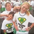  ?? / Contribute­d ?? Jamie with big sister Shannon and older brother Conor at Jamie’s first Rome Leprechaun-a-thon 5K.