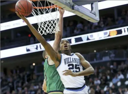  ?? MEL EVANS - ASSOCIATED PRESS FILE ?? Villanova’s Mikal Bridges (25) played an important part on defense the last time the Wildcats played Kansas in the NCAA tournament. The Great Valley graduate will have an even bigger role tonight when Villanova meets Kansas for a spot in the national championsh­ip game.