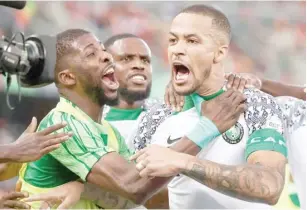  ?? ?? William Troost-Ekong celebrates with teammates after firing in the penalty against Elephants of Cote d’Ivoire