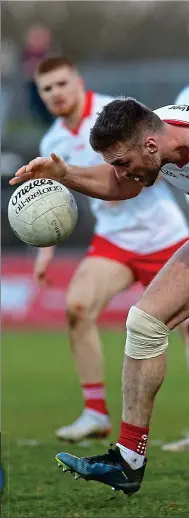  ?? ?? MAN AND BALL: Tyrone’s Brian Kennedy escapes Mayo’s Donnacha McHugh (right), while (left) Richard Donnelly of Tyrone is tackled by Mayo’s Matthew Ruane in the clash in Omagh yesterday