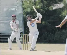  ?? ?? Ryhope batsman Paul Jenkin hits down the wicket.