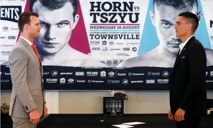  ?? Photograph: Dave Hunt/AAP ?? Jeff Horn and Tim Tszyu engage in a socially-distanced face-off in the buildup to Wednesday’s fight.