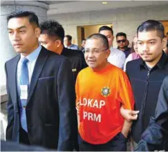  ?? BERNAMAPIX ?? Mohd Isa arriving for court proceeding­s yesterday.