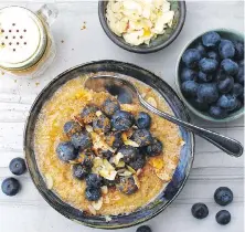  ??  ?? Quinoa porridge is topped with fresh blueberrie­s and a touch of cinnamon and honey.