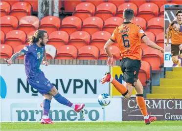  ?? ?? Striker Stevie May fires home the opening goal for Saints at Tannadice