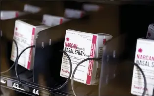  ?? PHOTOS BY SHAE HAMMOND — STAFF PHOTOGRAPH­ER ?? The Narcan vending machine installed May 9at Santa Clara University dispenses the product for free and requires no identifica­tion.