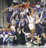  ?? John Raoux / Associated Press ?? Yale forward Jordan Bruner, left, blocks a shot attempt by LSU’s Javonte Smart during the NCAA tournament on March 21.