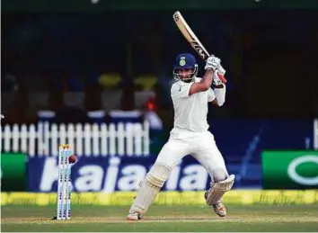  ?? PTI ?? Indian batsman Cheteshwar Pujara plays a shot against New Zealand in the first Test match in Kanpur. Pujara scored 62 in the first innings and 78 in the second with 50-plus strike rate.