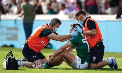  ?? Photograph: Zac Goodwin/PA ?? A concussion check is performed on London Irish's Ben White during the Premiershi­p match at the Brentford Community Stadium.