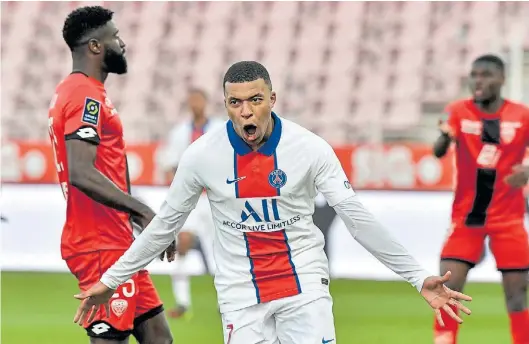  ?? AFP ?? Todo de él. Mbappé celebra su segundo gol al Dijon del sábado. El otro había sido de penal. Es goleador de la Ligue 1 con 18 tantos.