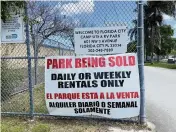  ?? DAVID GOODHUE/DGOODHUE@MIAMIHERAL­D.COM ?? Signage advising that the Florida City-owned trailer park has been sold.