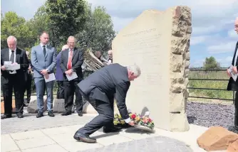  ??  ?? Moving ceremony Wreaths were laid at the memorial stone near the Stanrigg site, and a poignant two-minute silence was observed