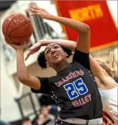  ??  ?? Chartiers Valley’s Perri Page is fouled going up for a shot.